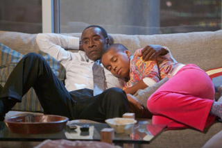 Don Cheadle as Marty Kaan and Donis Leonard, Jr. as Roscoe in House of Lies.